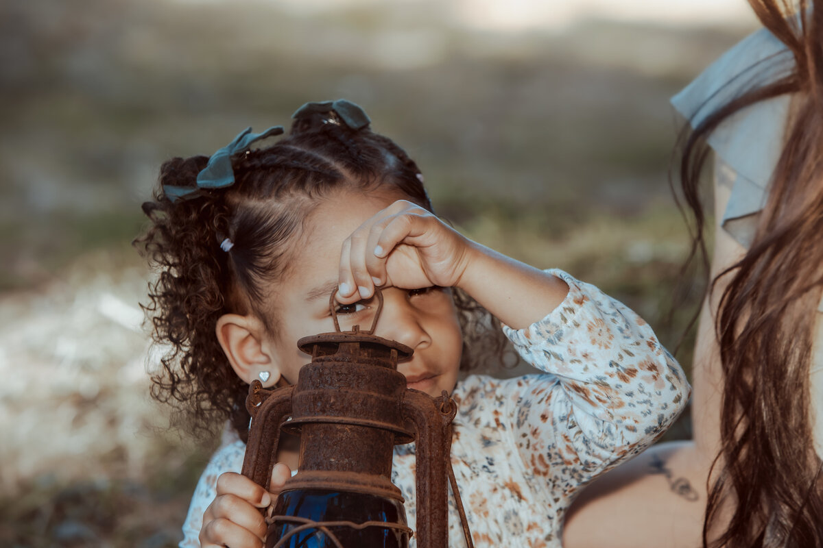 Little Girl Playing with Lantern – Prospect Park Redlands Family Photography