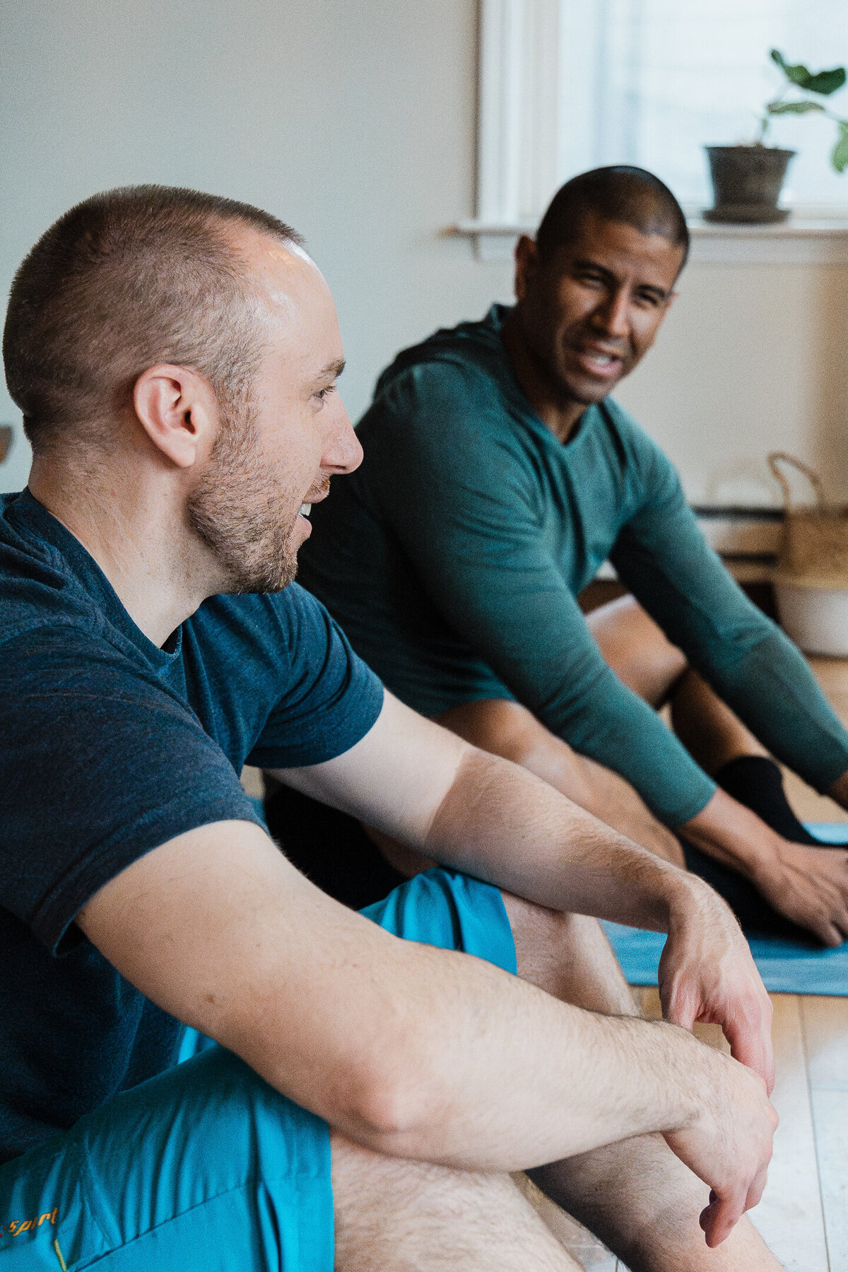 men in a discussion during a class at Pause + Purpose
