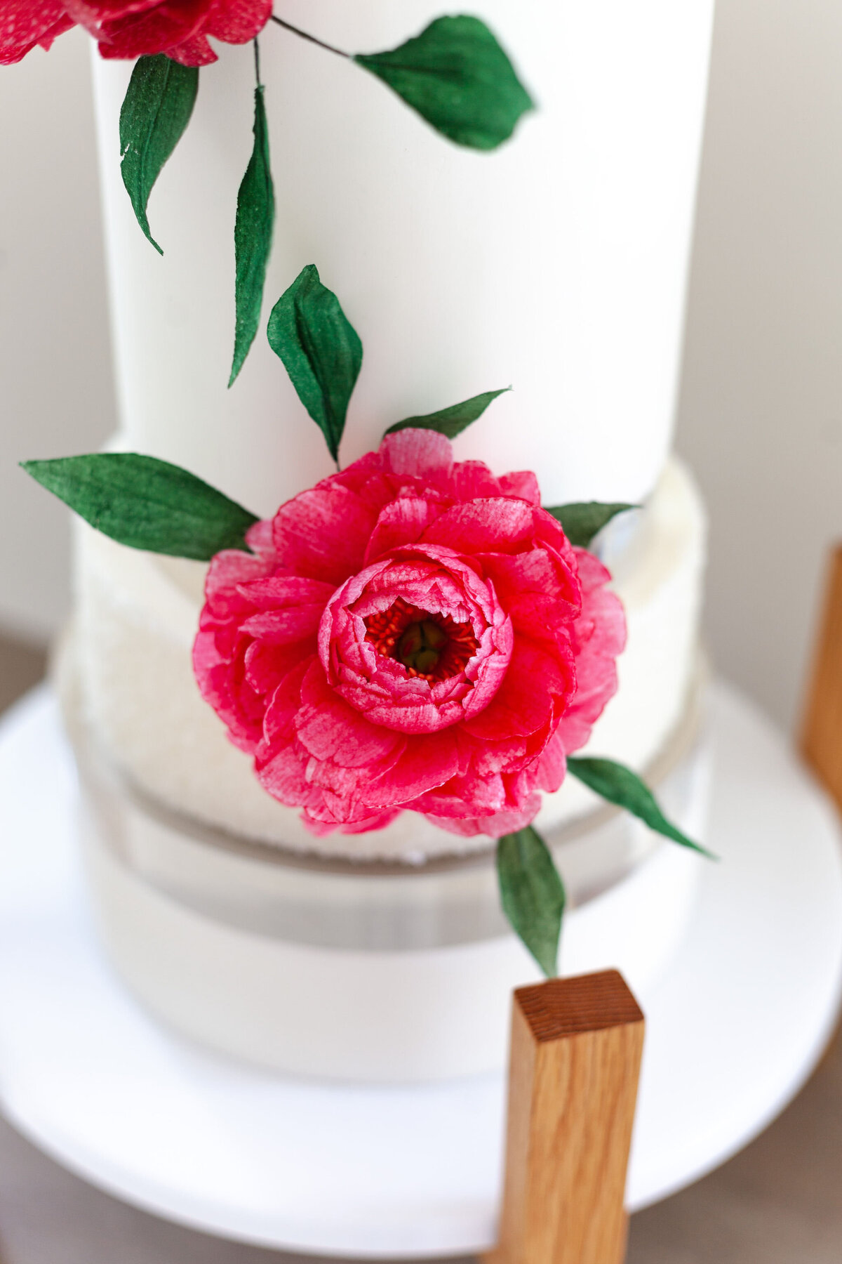 Luxury nature inspired wedding cake designer vanilla Spice Cake Studio Northamptonshire red sugar flower design