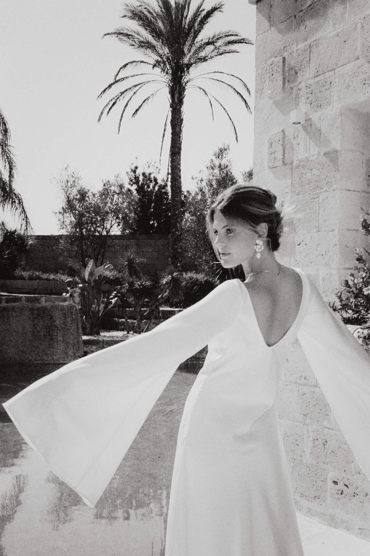 Elegant bridal portrait by Wedding Photographer Spain in romantic Mediterranean setting

