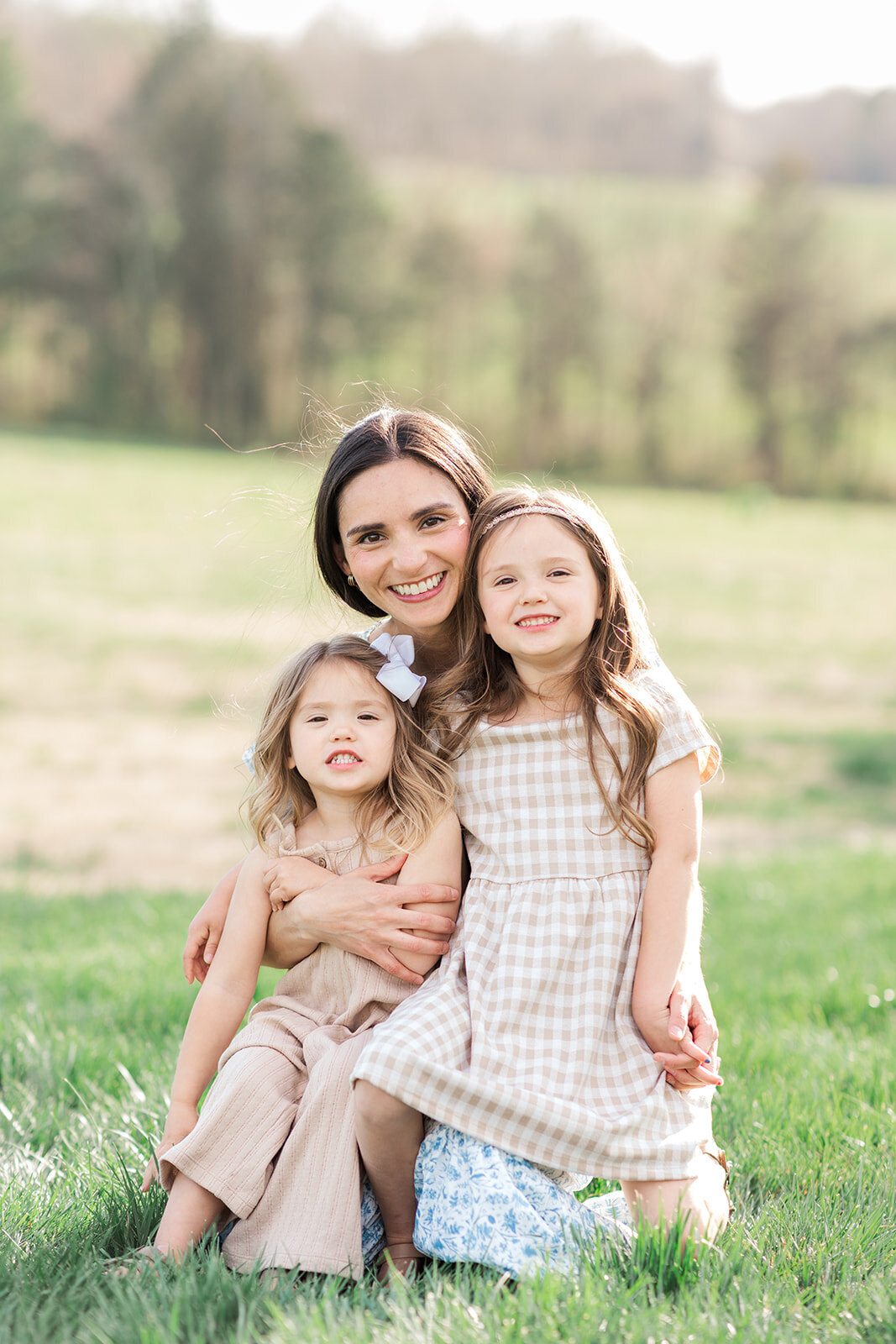 Extended family portrait with mother and 2 daughters