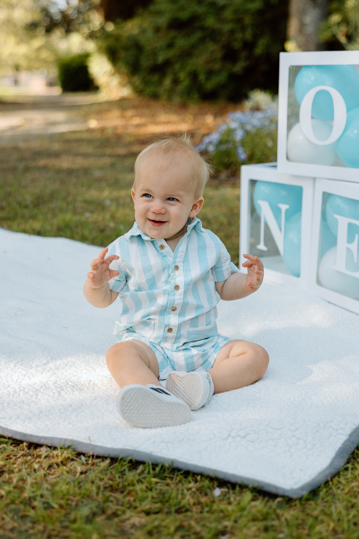 Baby's first birthday photoshoot with a smash cake