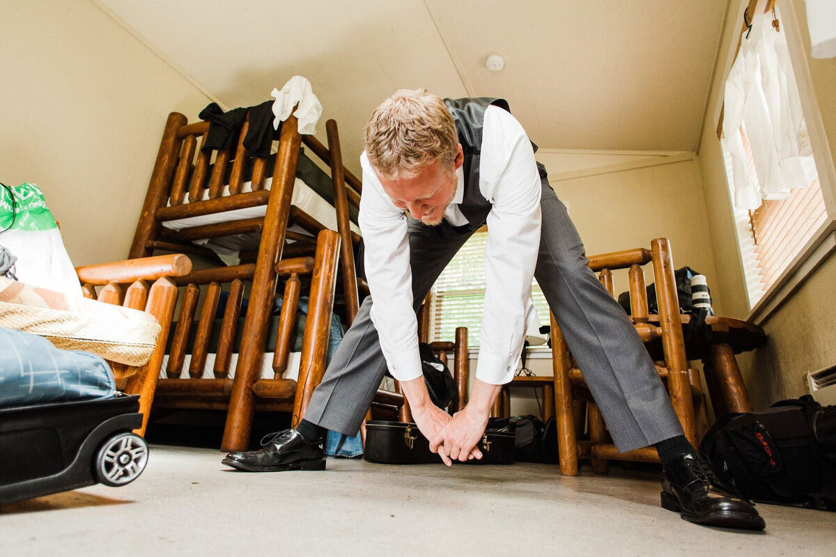 A groom stretches before his wedding day on the Kitsap Peninsula