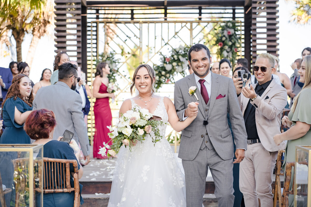 mexico-wedding-ceremony-exit-happy-couple-harry-mclaughlin-photography