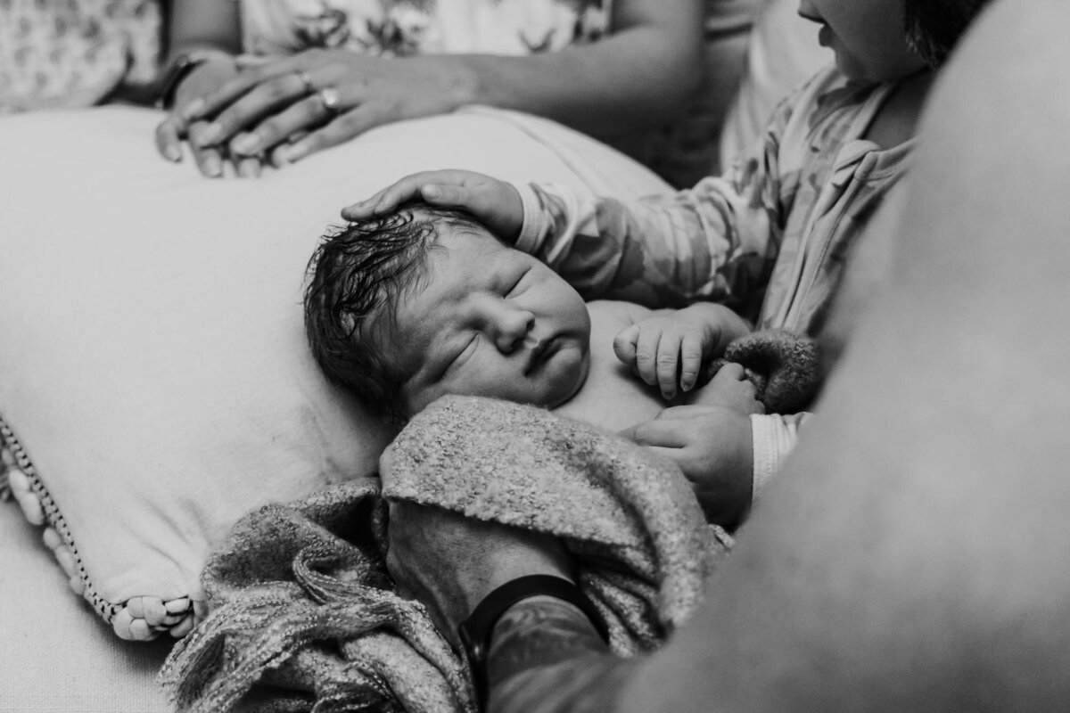 The moment of birth photographed to keep and lok at again and again._-196