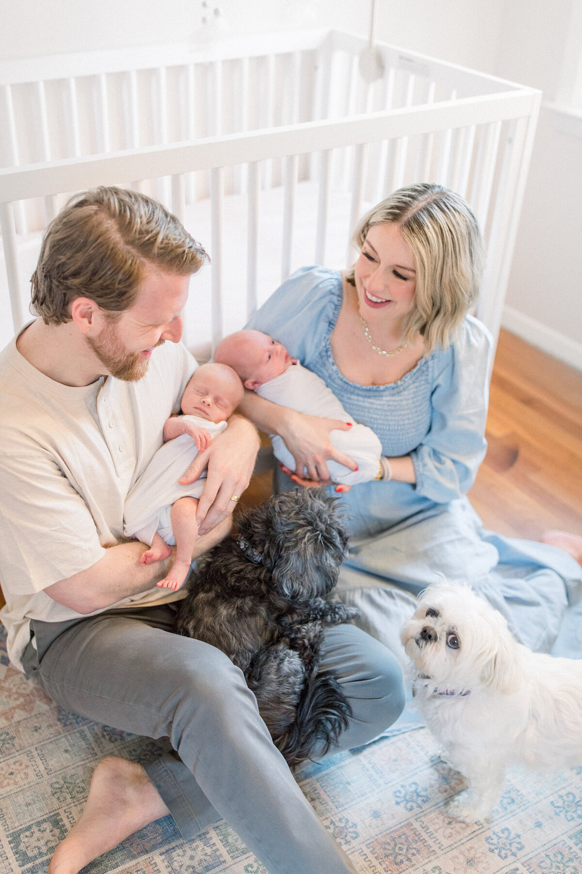 atlanta twin photographer - in home lifestyle session with newborn twins and parents, maltese dog
