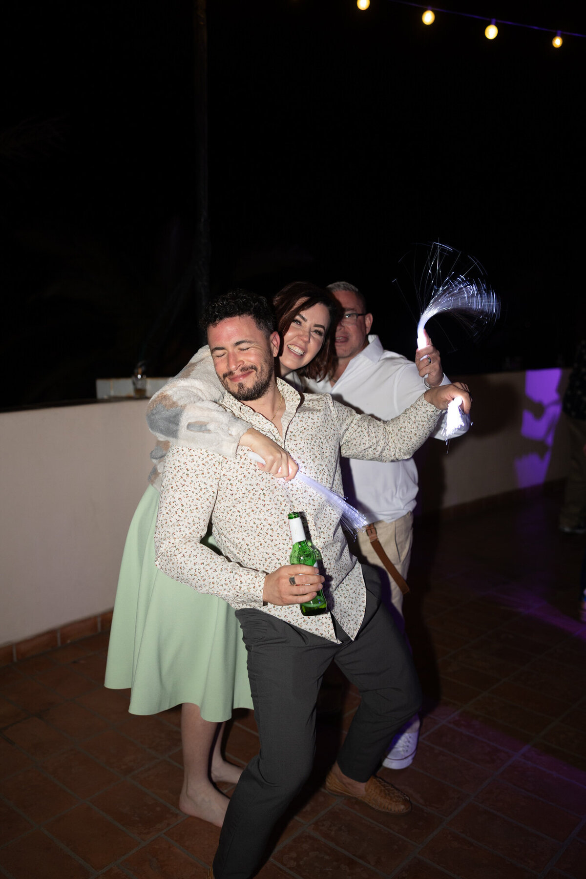 Guests dancing on dance floor at Hilton Beachfront Resort Santa Barbara