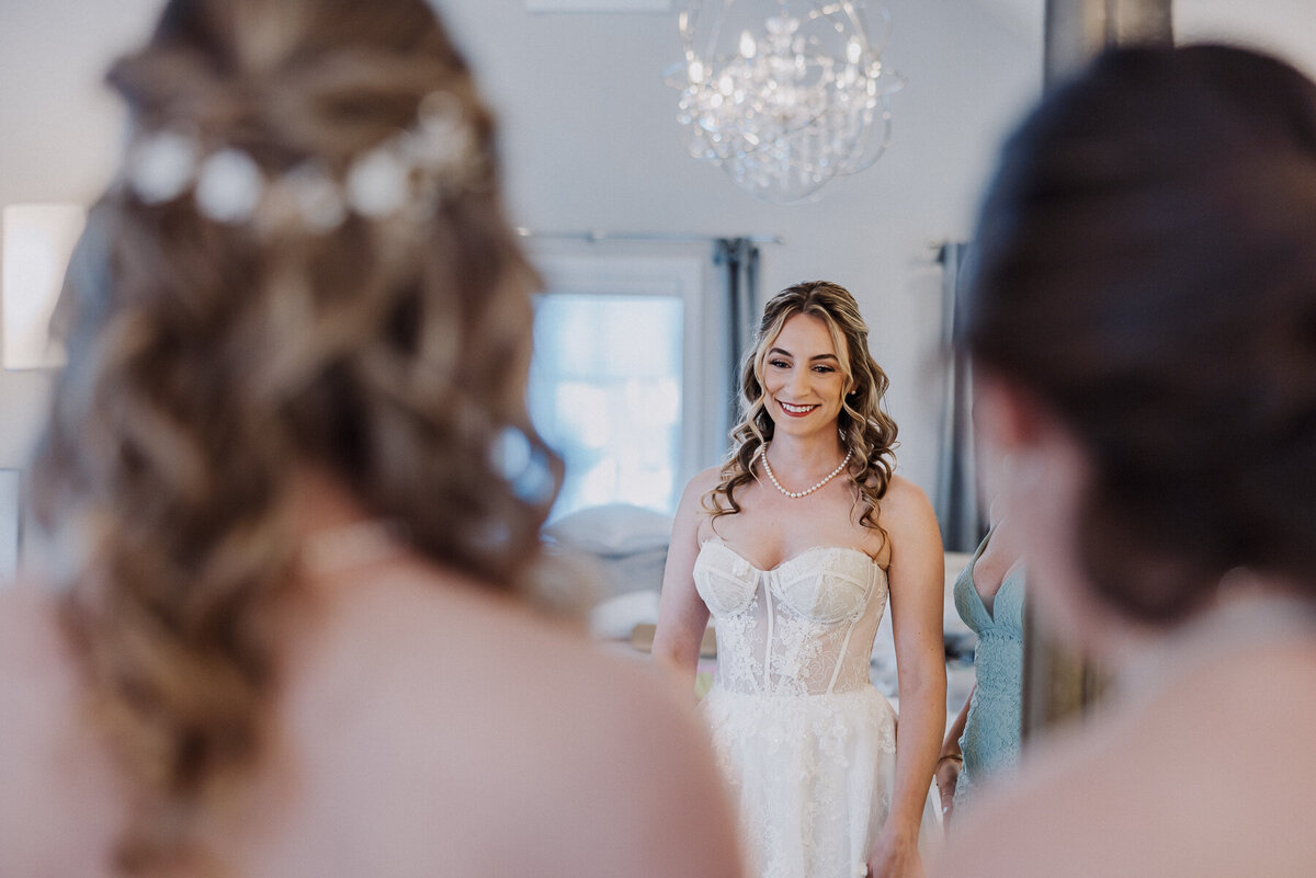 bride seeing herself in the mirror, jewish ponte winery wedding temecula