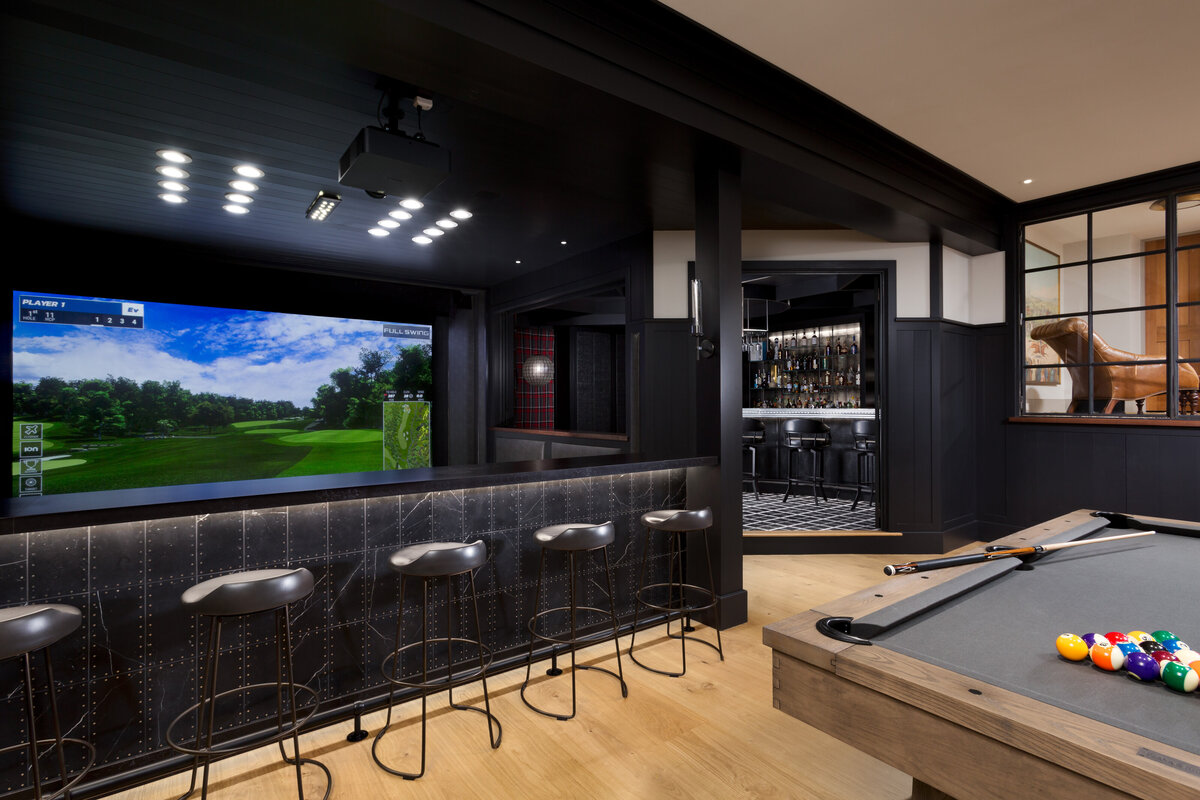 bar overlooking golf simulator