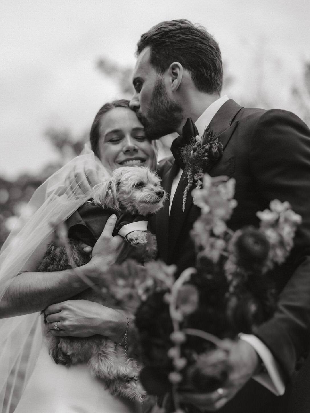 troutbeck-13-intimate-couple-portrait-with-groom-kissing-bride-at-troutbeck-jenny-fu-studio