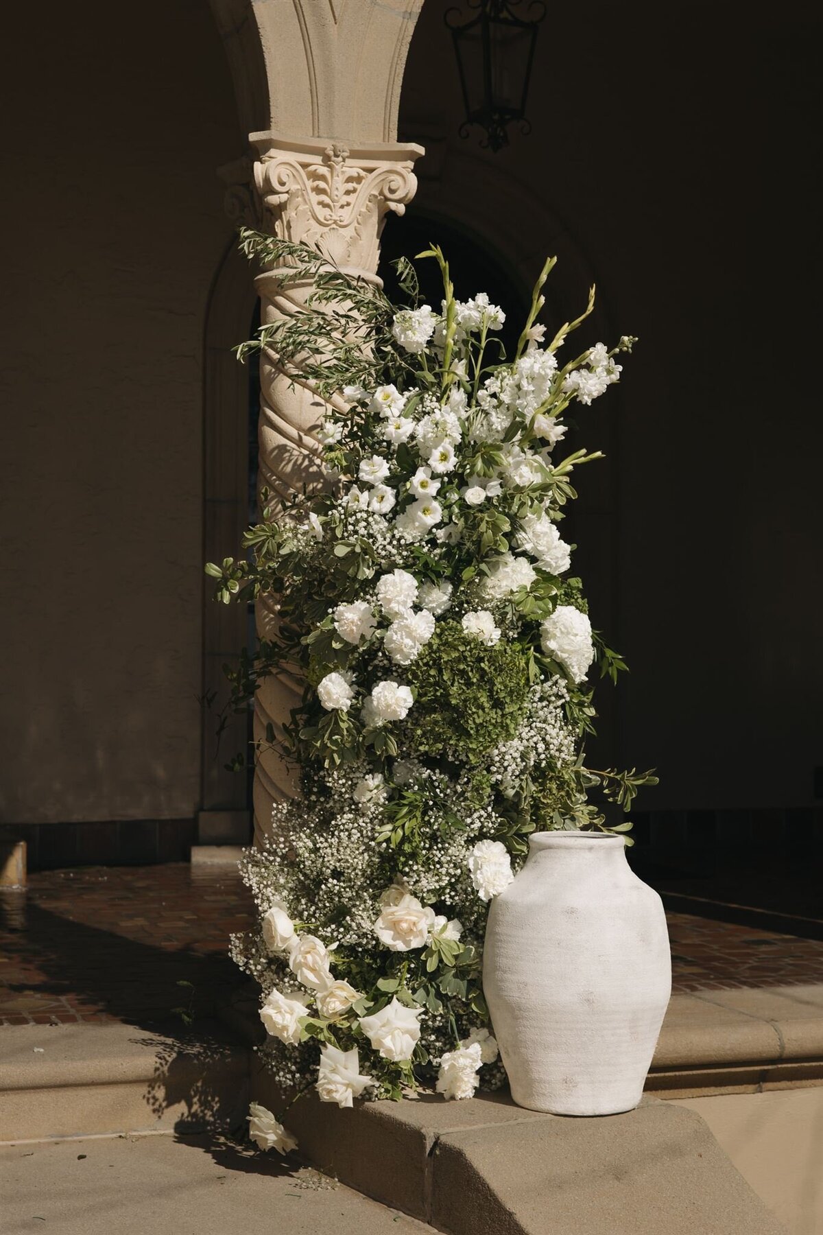 White and greenery ceremony piece