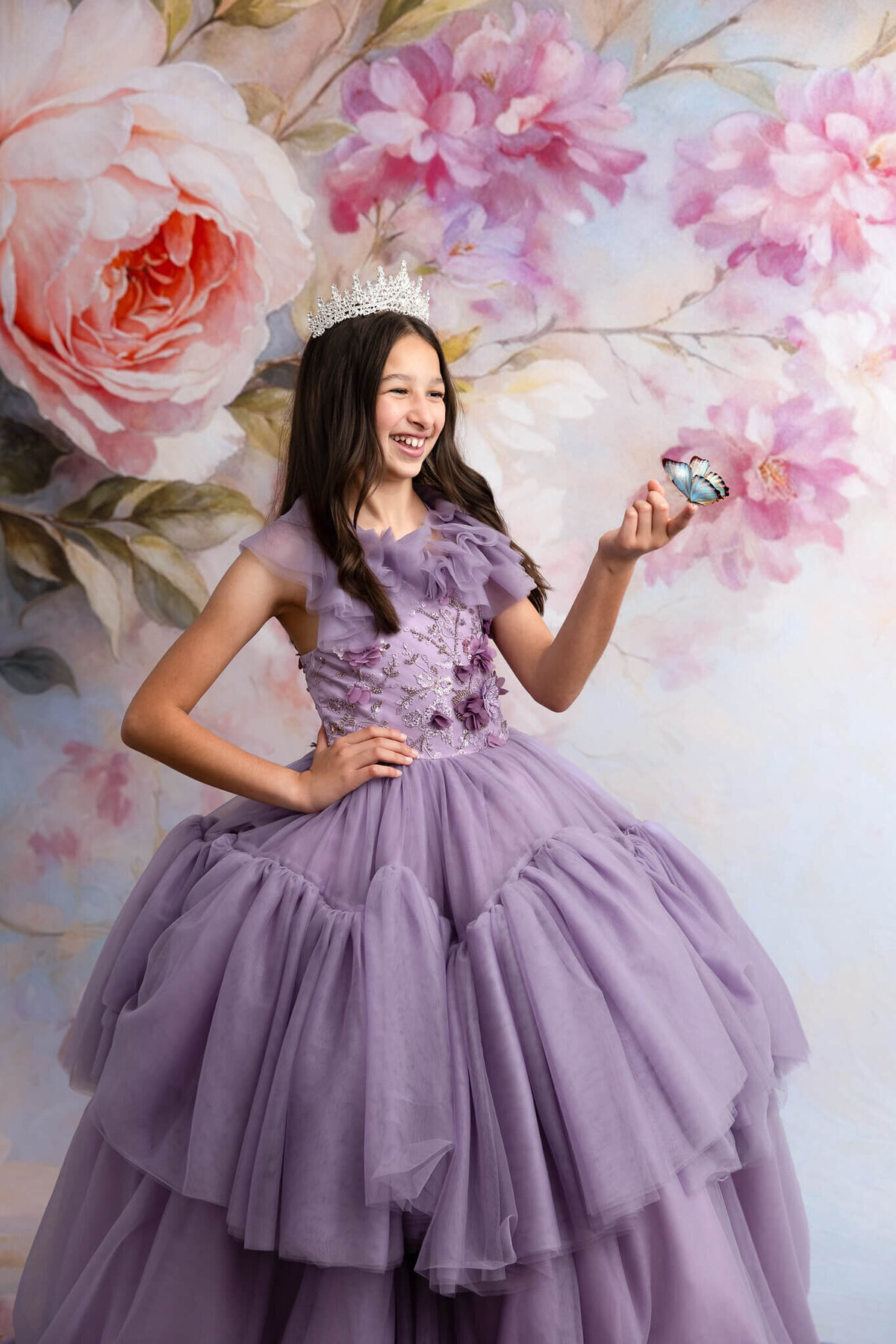 Young girl wearing violet couture gown during fine art session in La Vernia