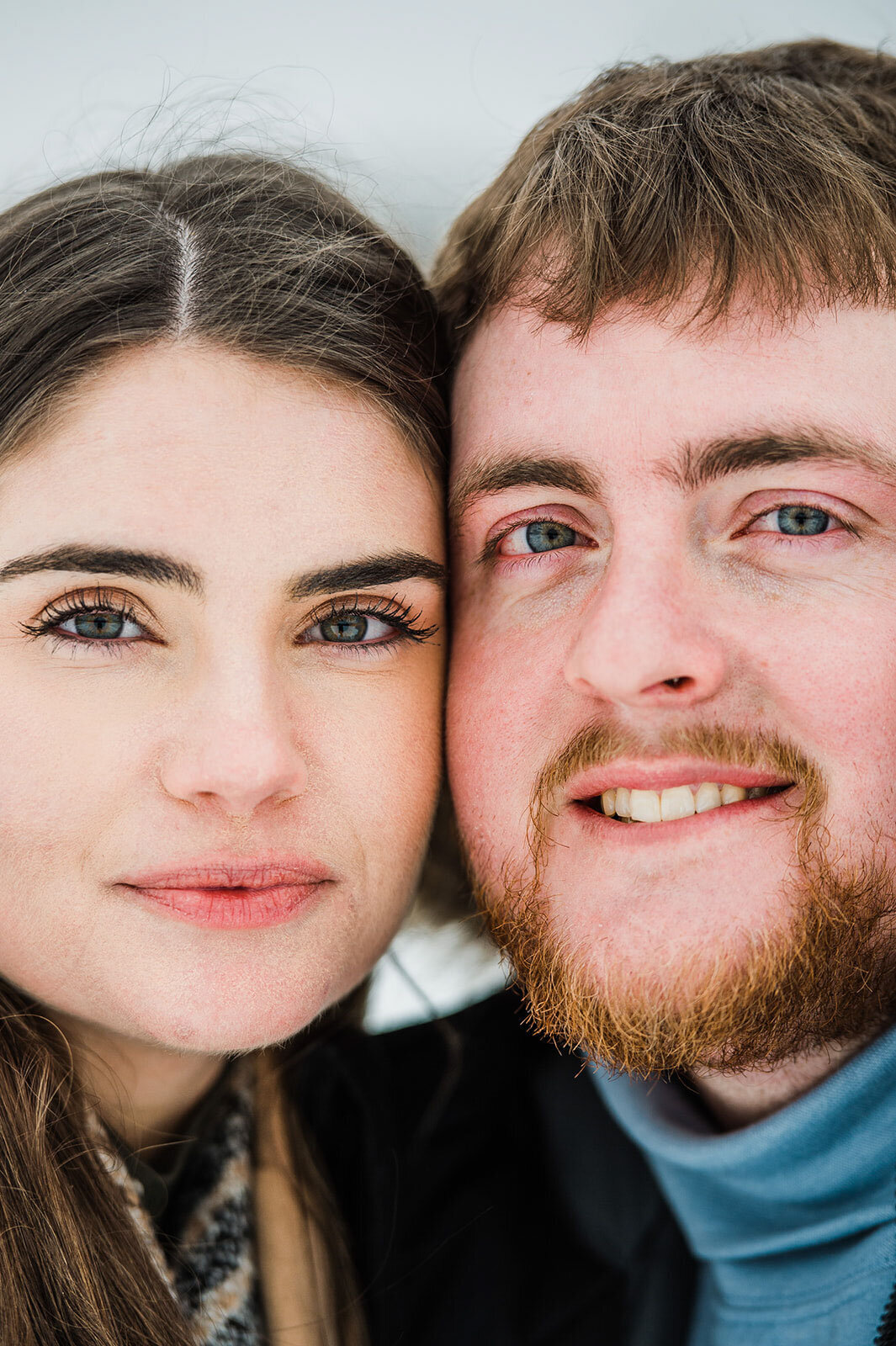 closeup of engaged couple faces winter mountain top inn vermont
