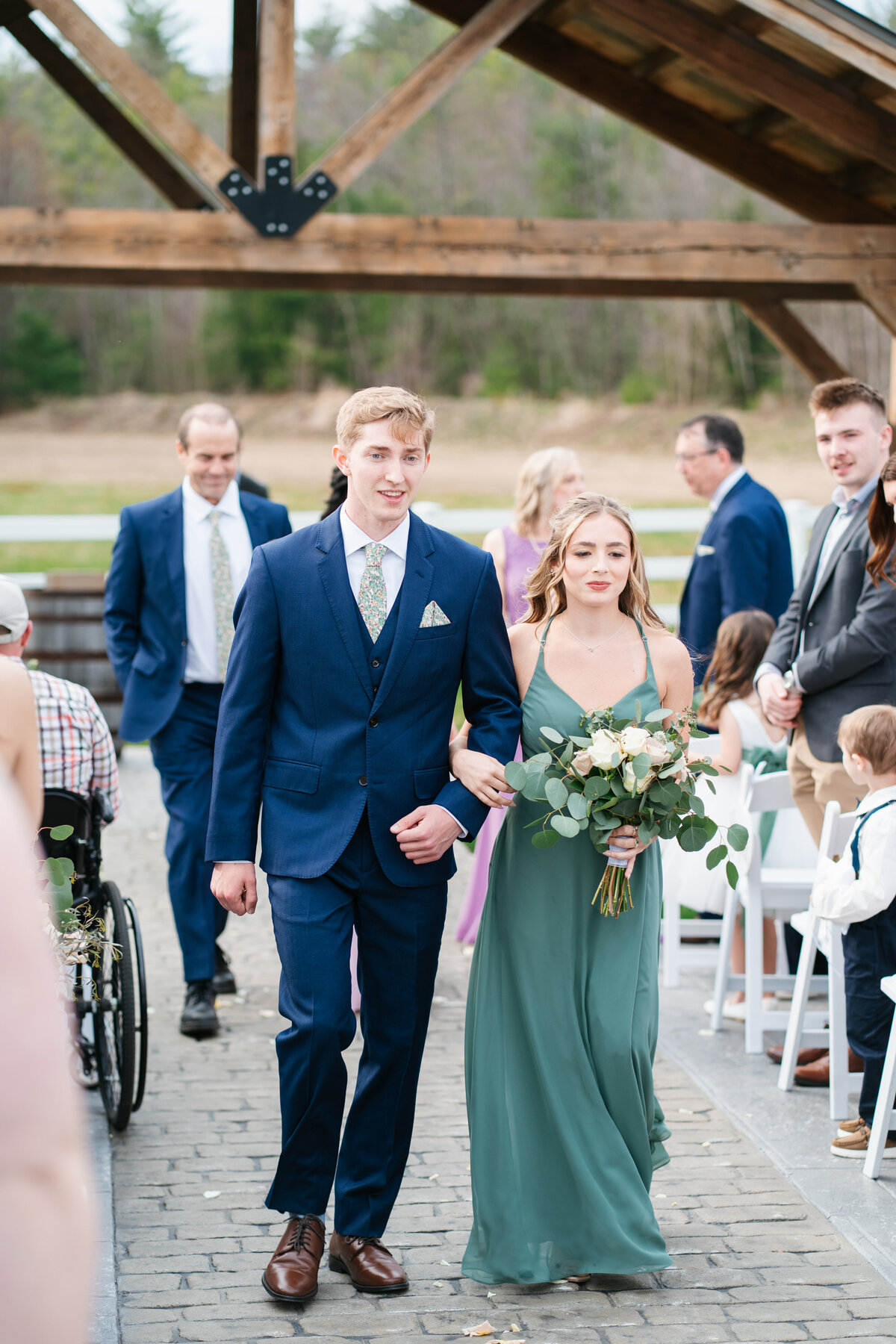 Extended family gathered for group wedding photos

