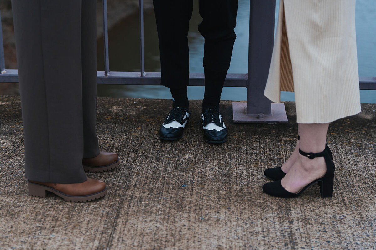 The feet of two wives and their officiant during their Nashville elopement