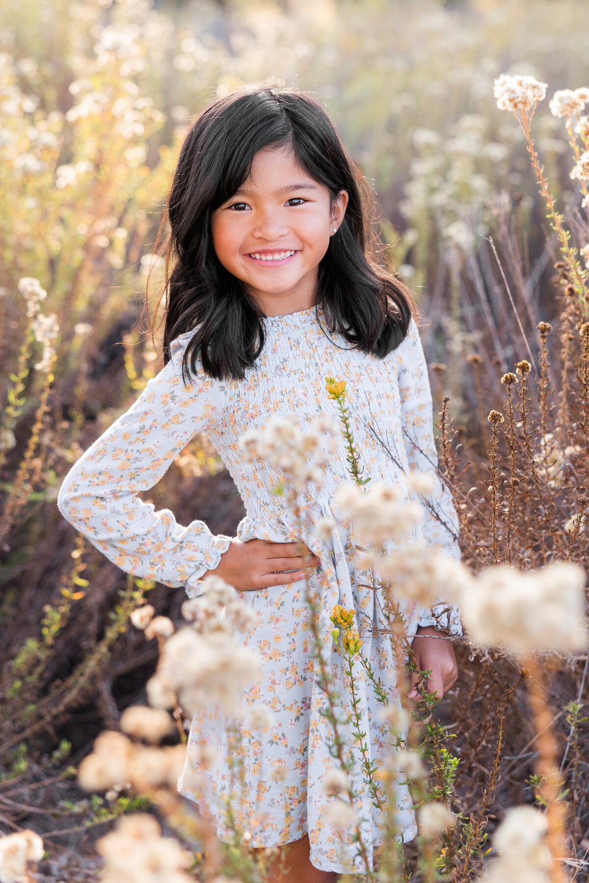 young girl standing on glowy field san diego