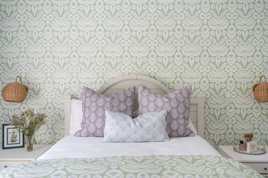 sweet southern home craftsman cutie green and purple wallpaper and bed in bedroom