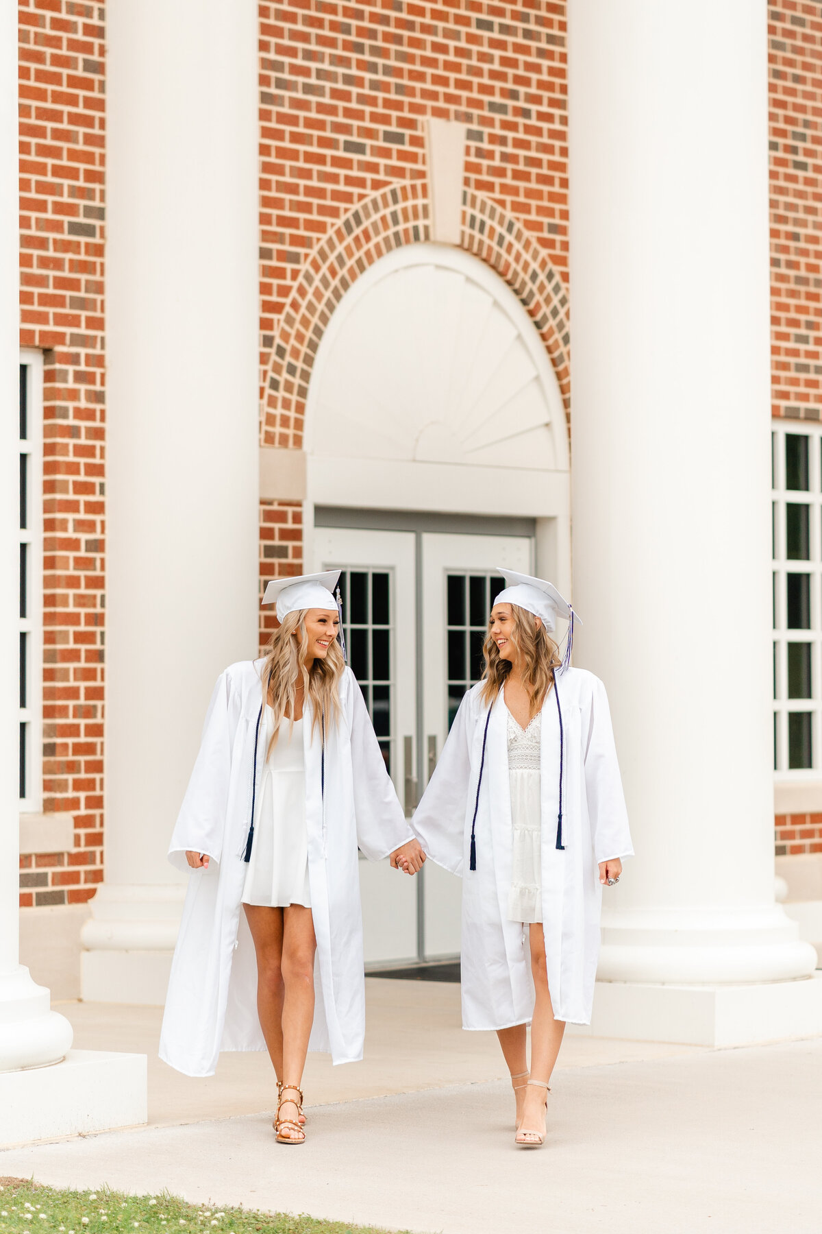 Kelley Hoagland is a Chattanooga senior photographer taking cap and gown portraits on location at Gordon Lee High School.  Graduates posed walking.