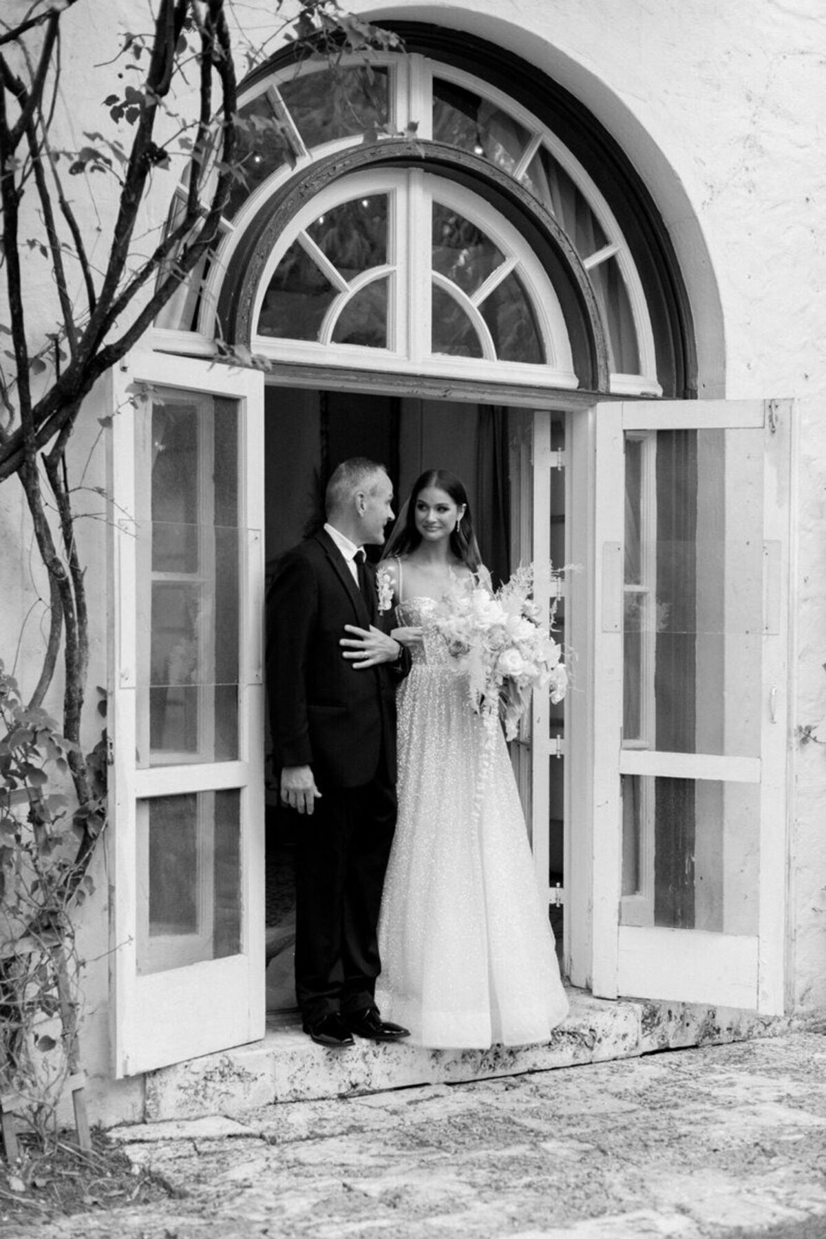 Bride and groom at venue in Orlando, by Marissa Nicole Photography