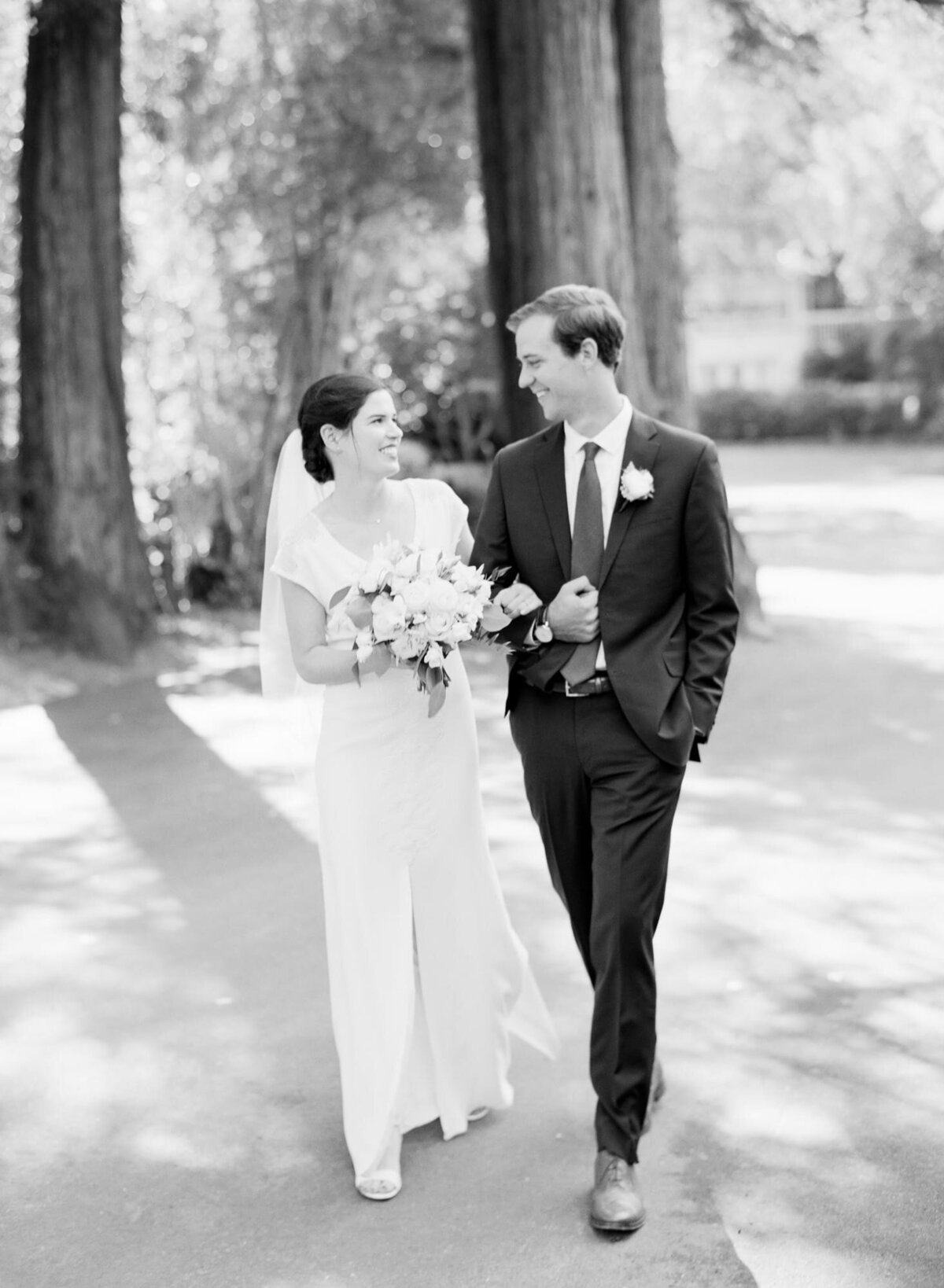 A successful marriage requires falling in love many times, always with the same person. Grayscale picture of a newly-wed shot by wedding photographer Robin Jolin.