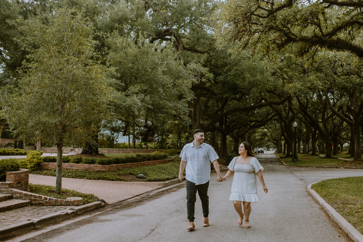 Strolling through the enchanting streets of Rice Village, Houston, I had the honor of capturing this couple's engagement photoshoot, filled with love and laughter. With the neighborhood's vibrant energy as our backdrop, every photograph captured the genuine connection and excitement as they celebrated their love in the heart of the city.