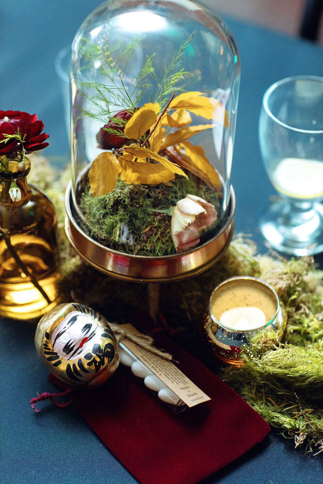 Table vignette of florals in glass holder