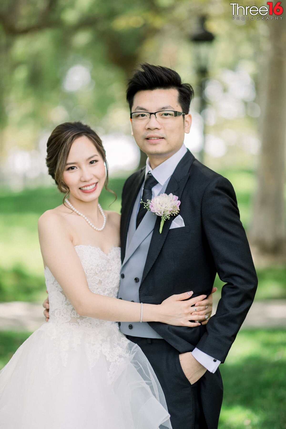 Bride and Groom pose for photos after the wedding ceremony