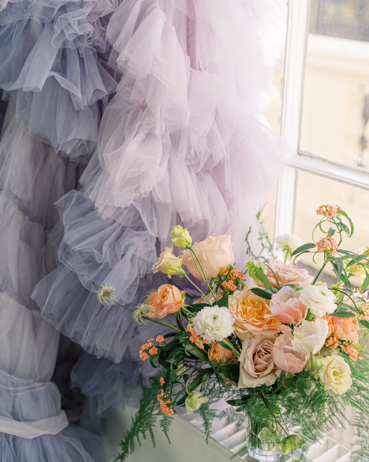Lilac wedding gown and florals at London wedding