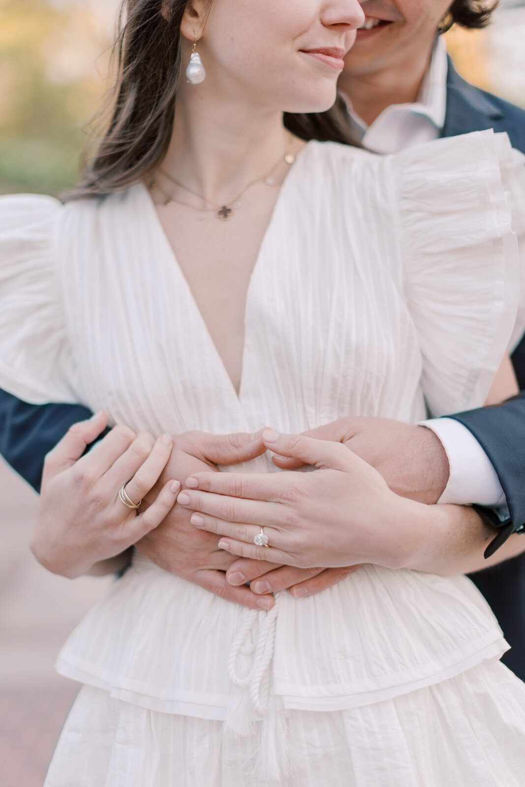 Couple holds hands in Central Park for Engagement Session