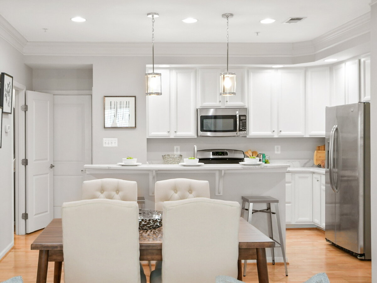 Kitchen and dining area all white