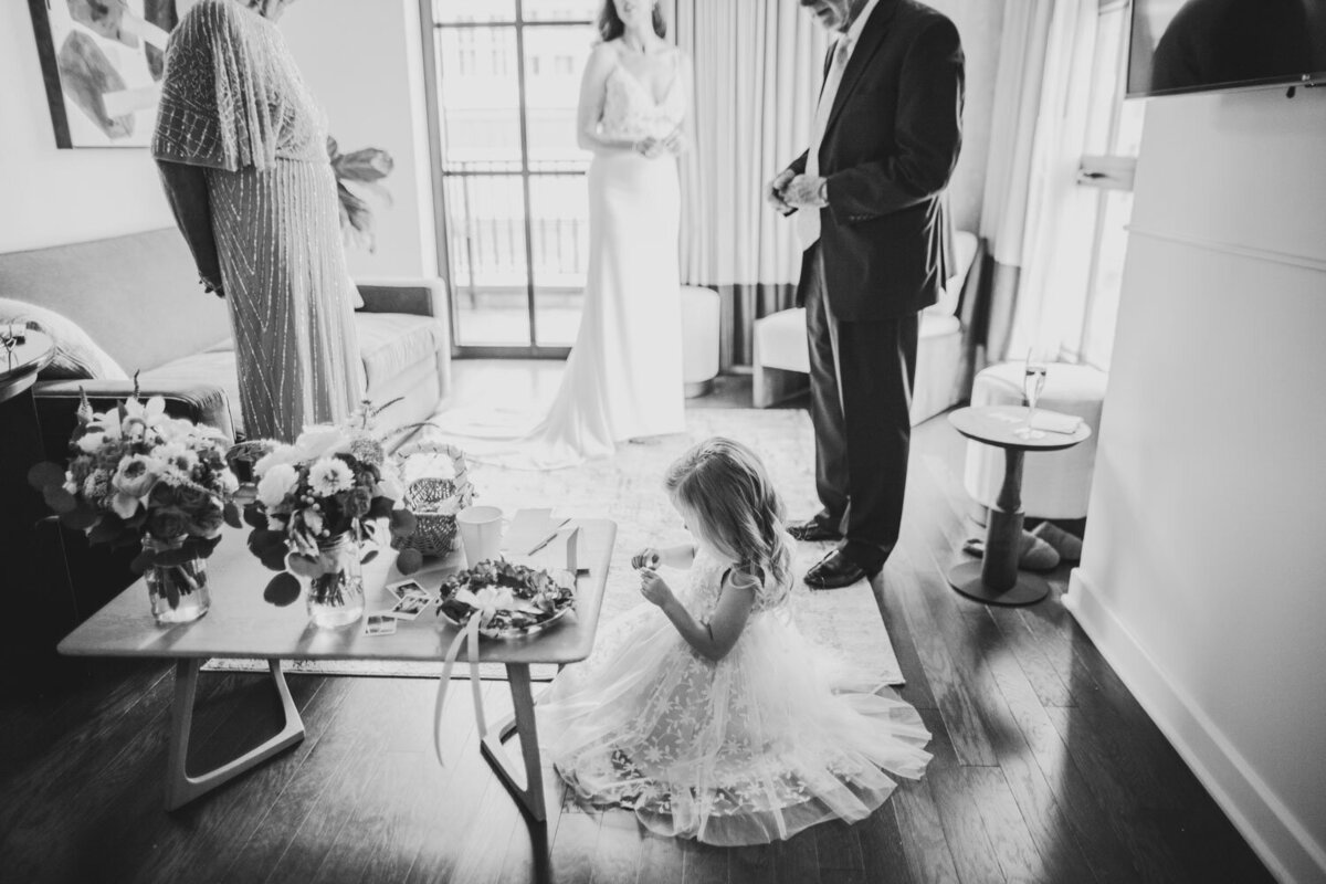 Flower girl sitting on the floor