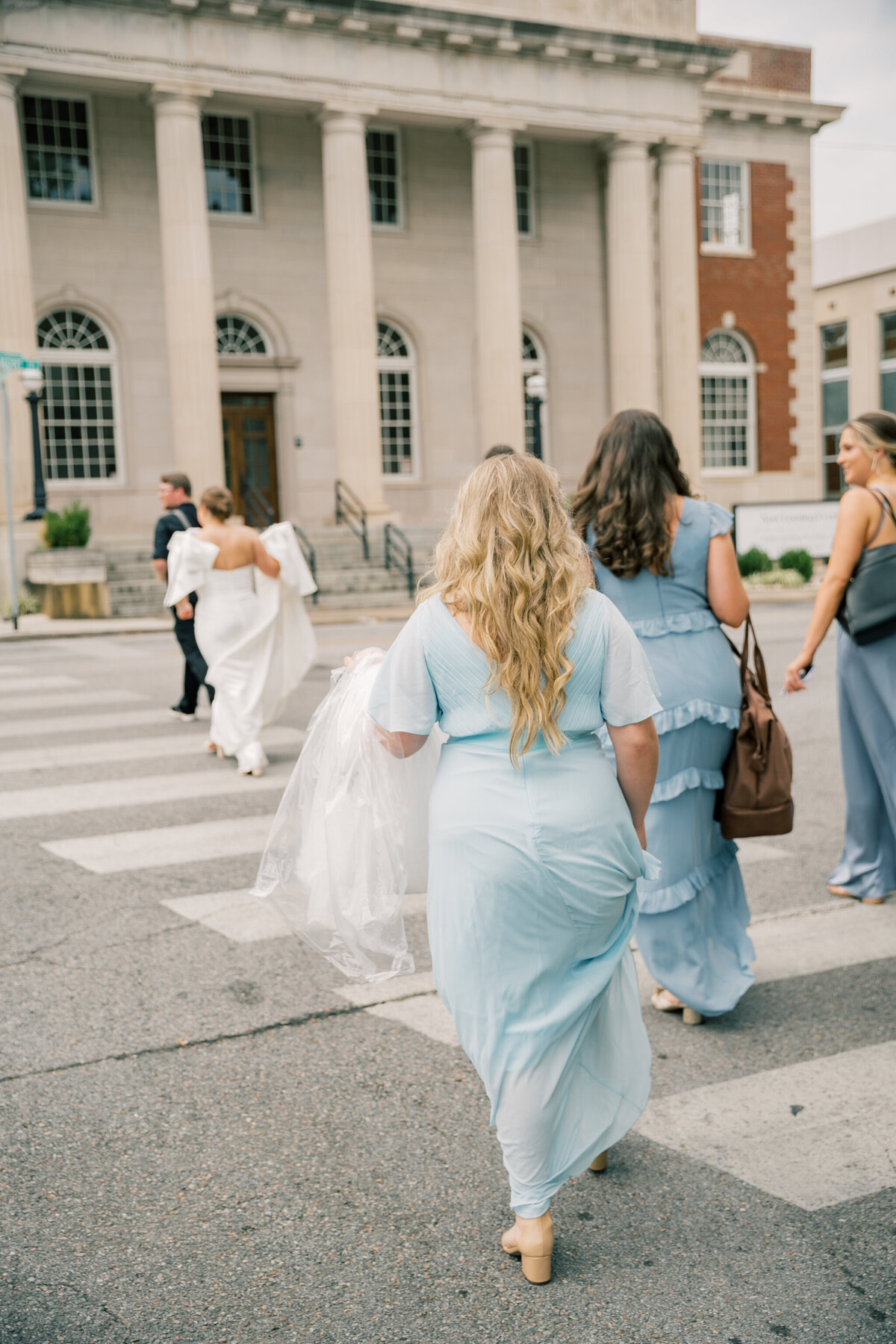 Bristol Train Station Wedding | candid moment of bride and and bridesmaids