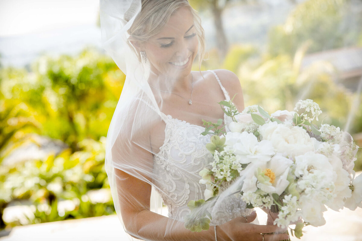 bride-under-veil-holding-bouquet-closeup-san-diego-wedding