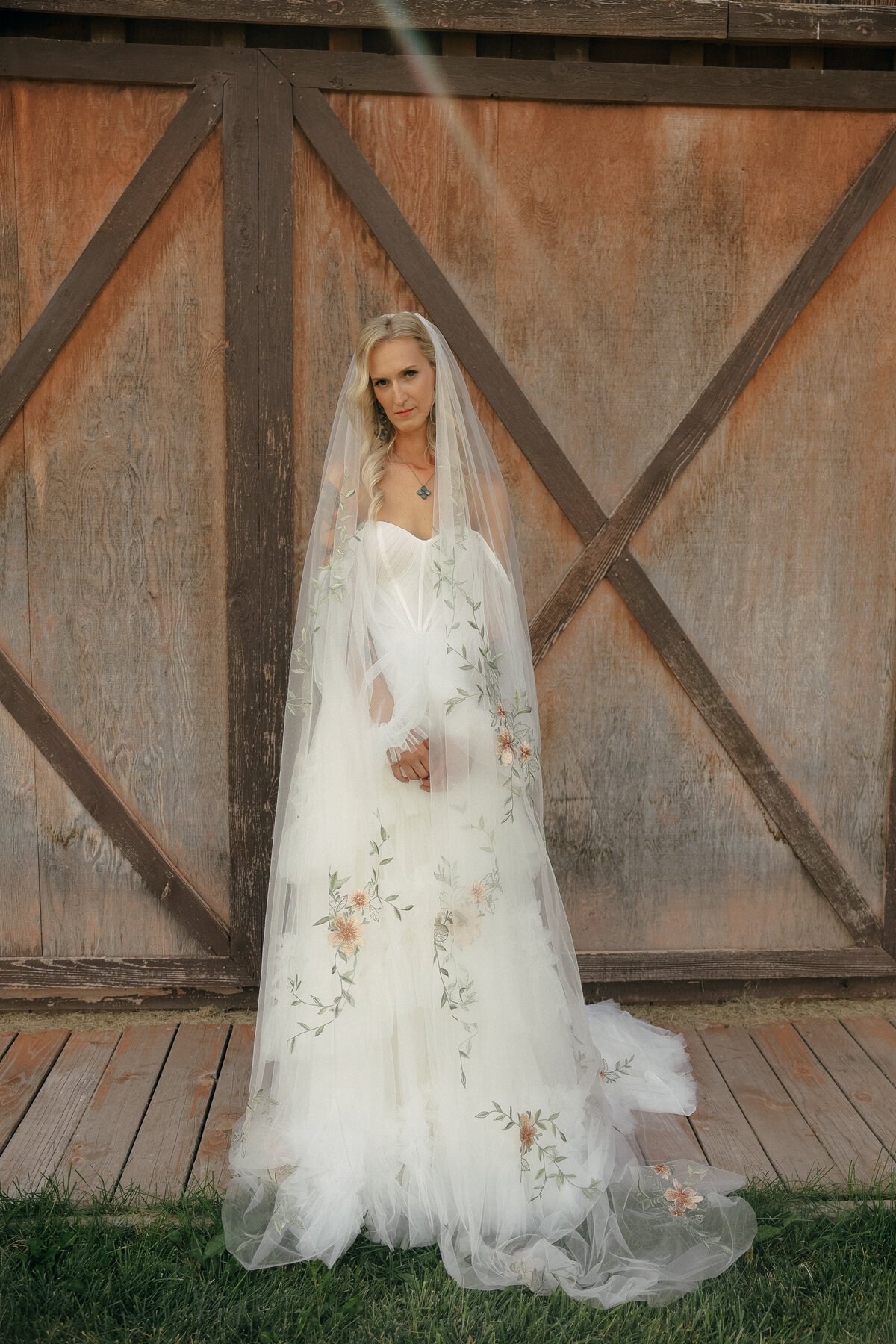 Floral Veil Bridal Portrait Against Rustic Barn Door | Oregon Bridal Photography