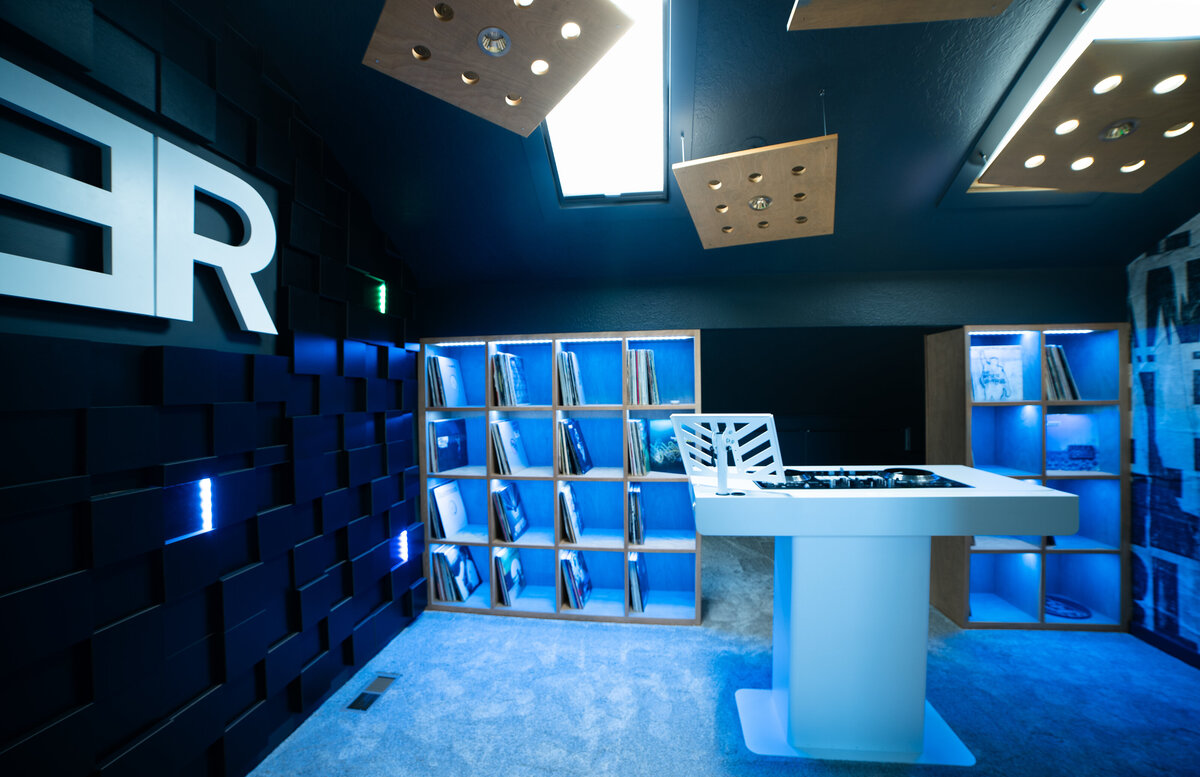DJ room with vinyl records and turn tables