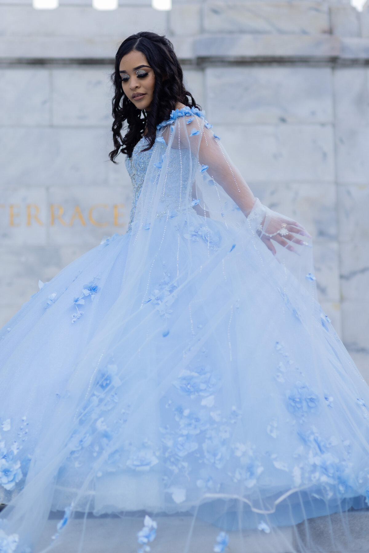 A breathtaking portrait of Victoria on the steps of University Circle, Cleveland, Ohio, highlighting her elegance and poise.