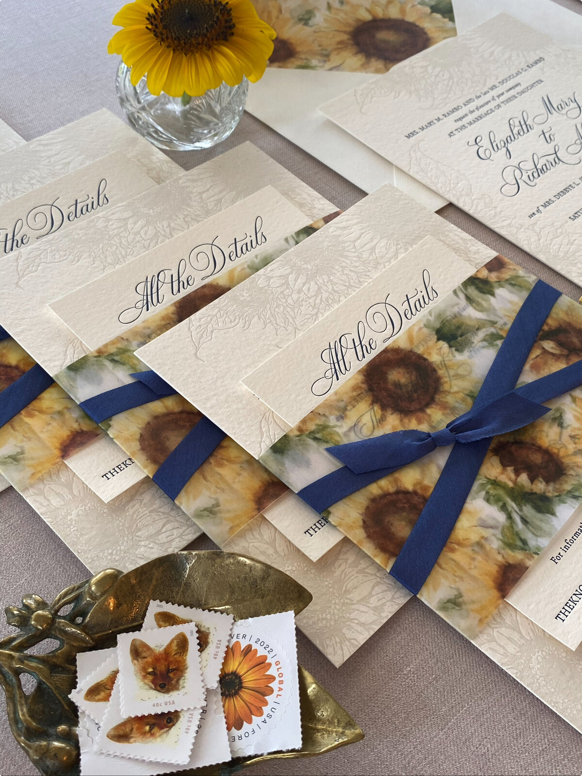 Elegant wedding invitation with blue ribbon, custom calligraphy and dog stamps