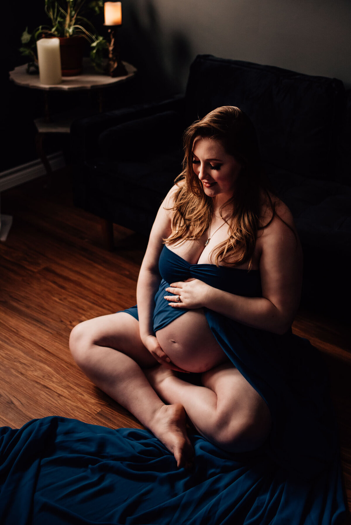 expecting mother posing for ottawa maternity boudoir photo