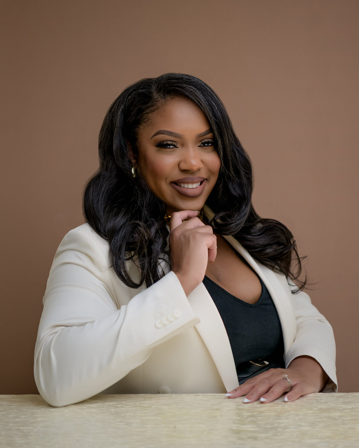 Polished branding headshot created in our Seattle studio, ideal for entrepreneurs and executives who want sophisticated portraits that project confidence and success.