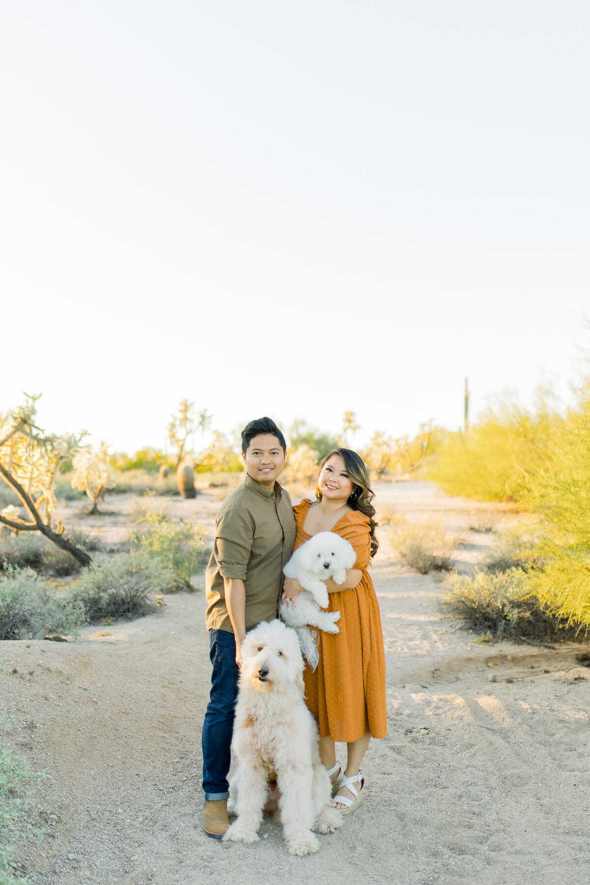 couples photoshoot with dogs