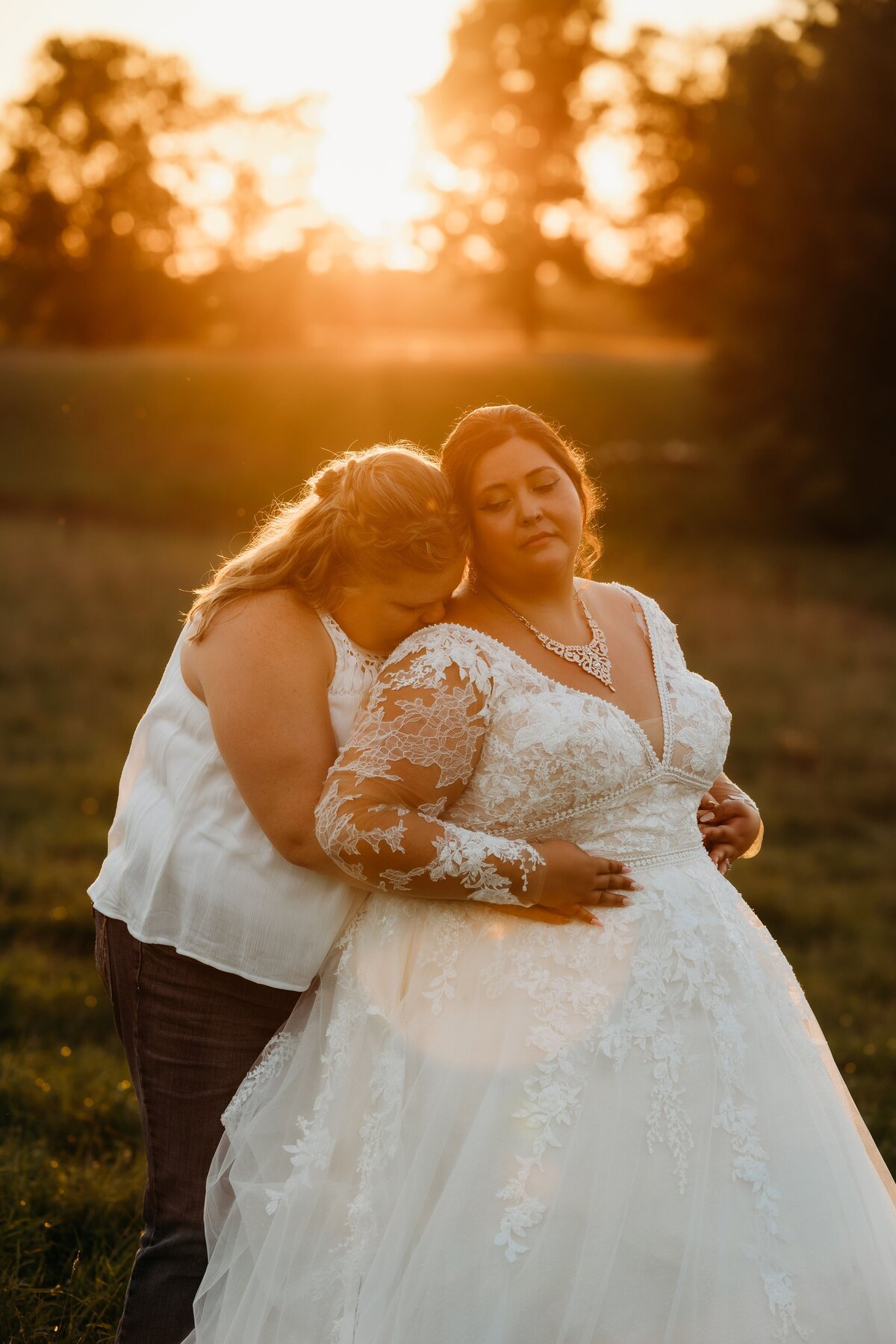 brides-standing-in-field