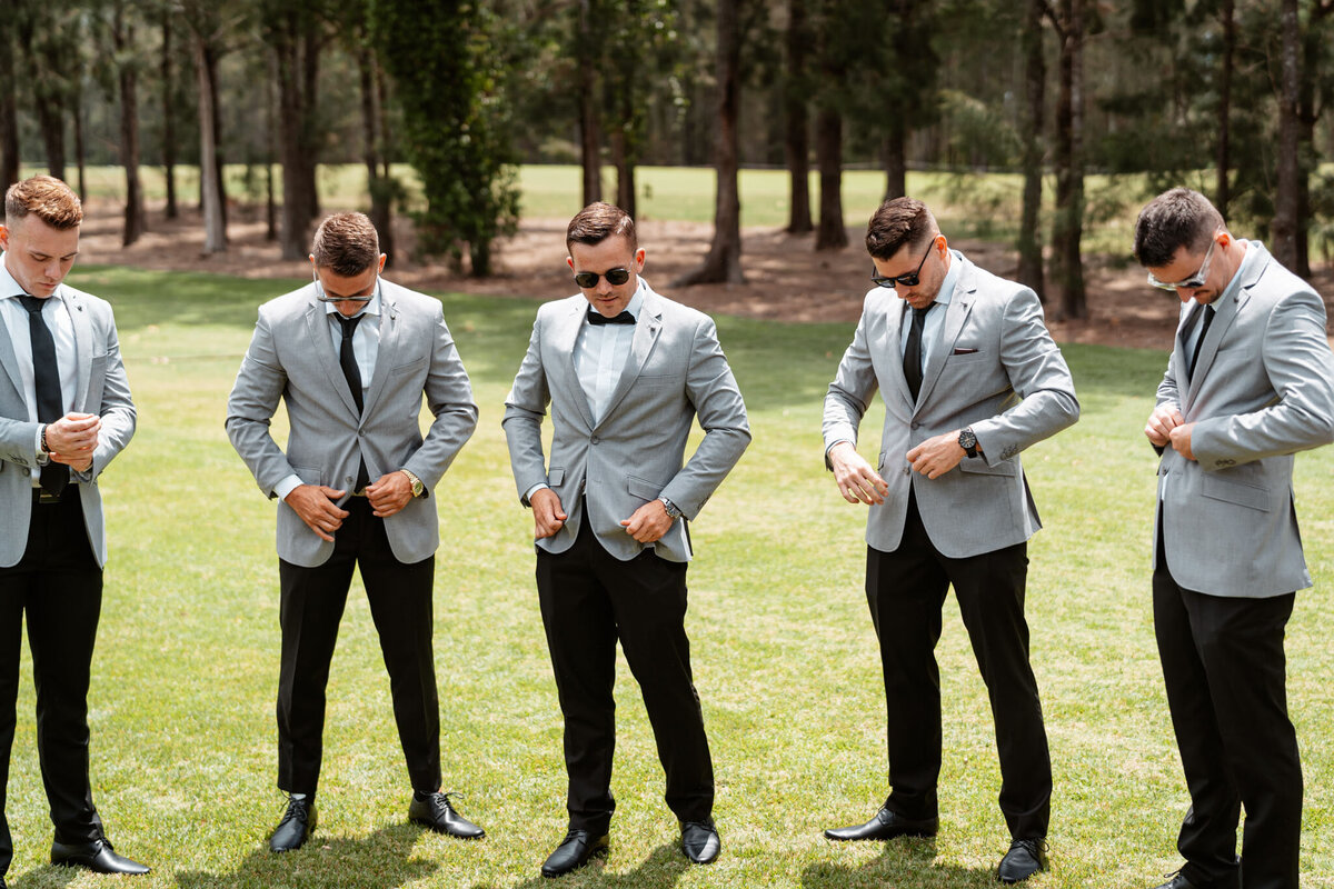 Ben together with his groomsmen having a fun photoshoot before the ceremony