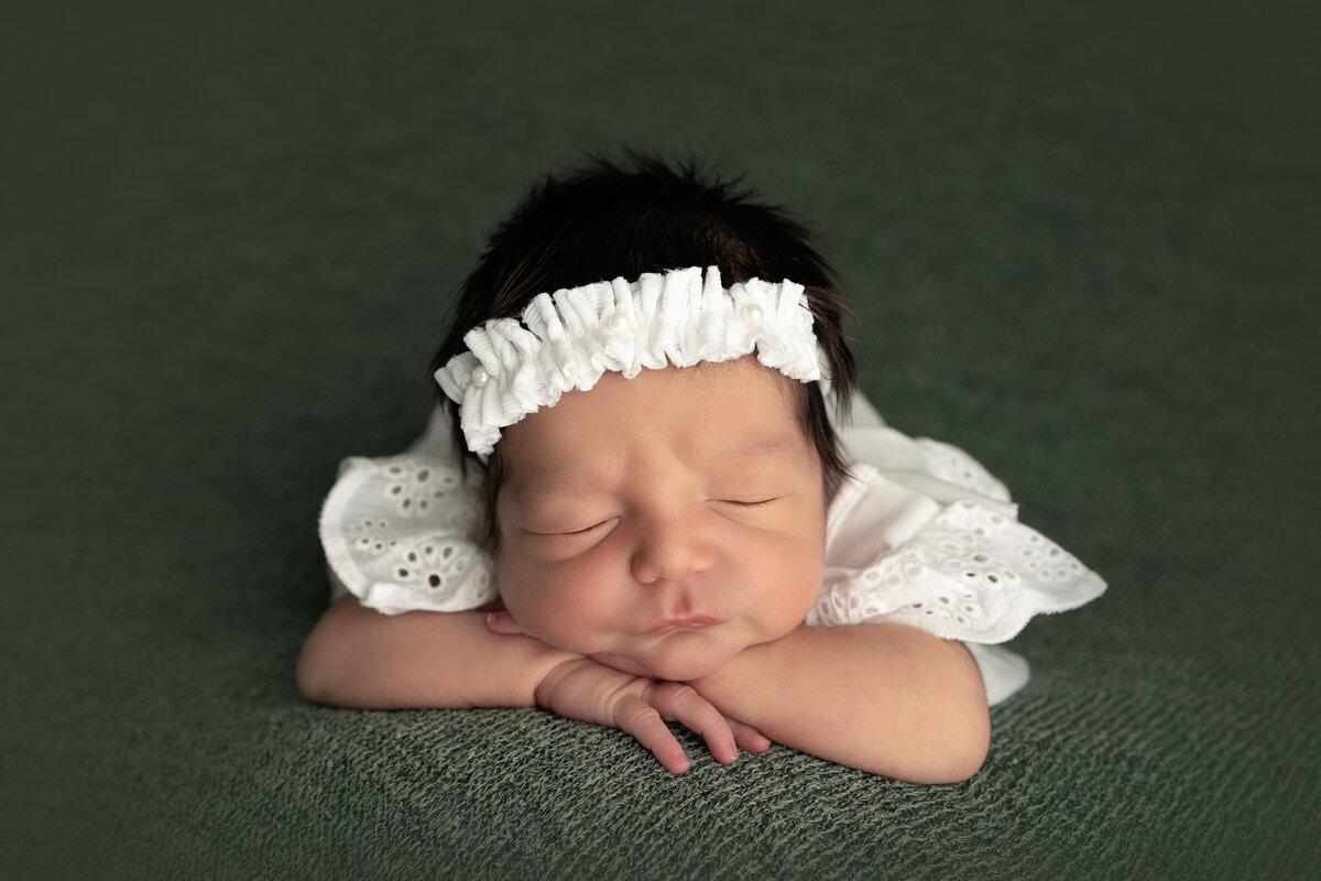 inland_empire_newborn_photographer_baby_girl_white_headband_dress