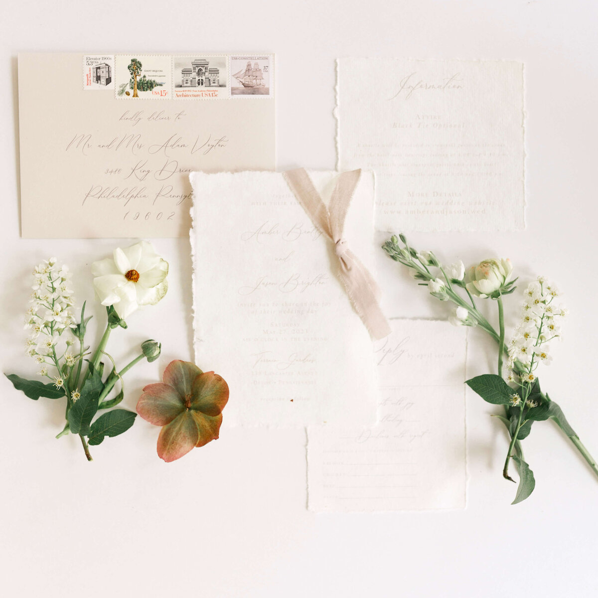 wedding details including invite and florals