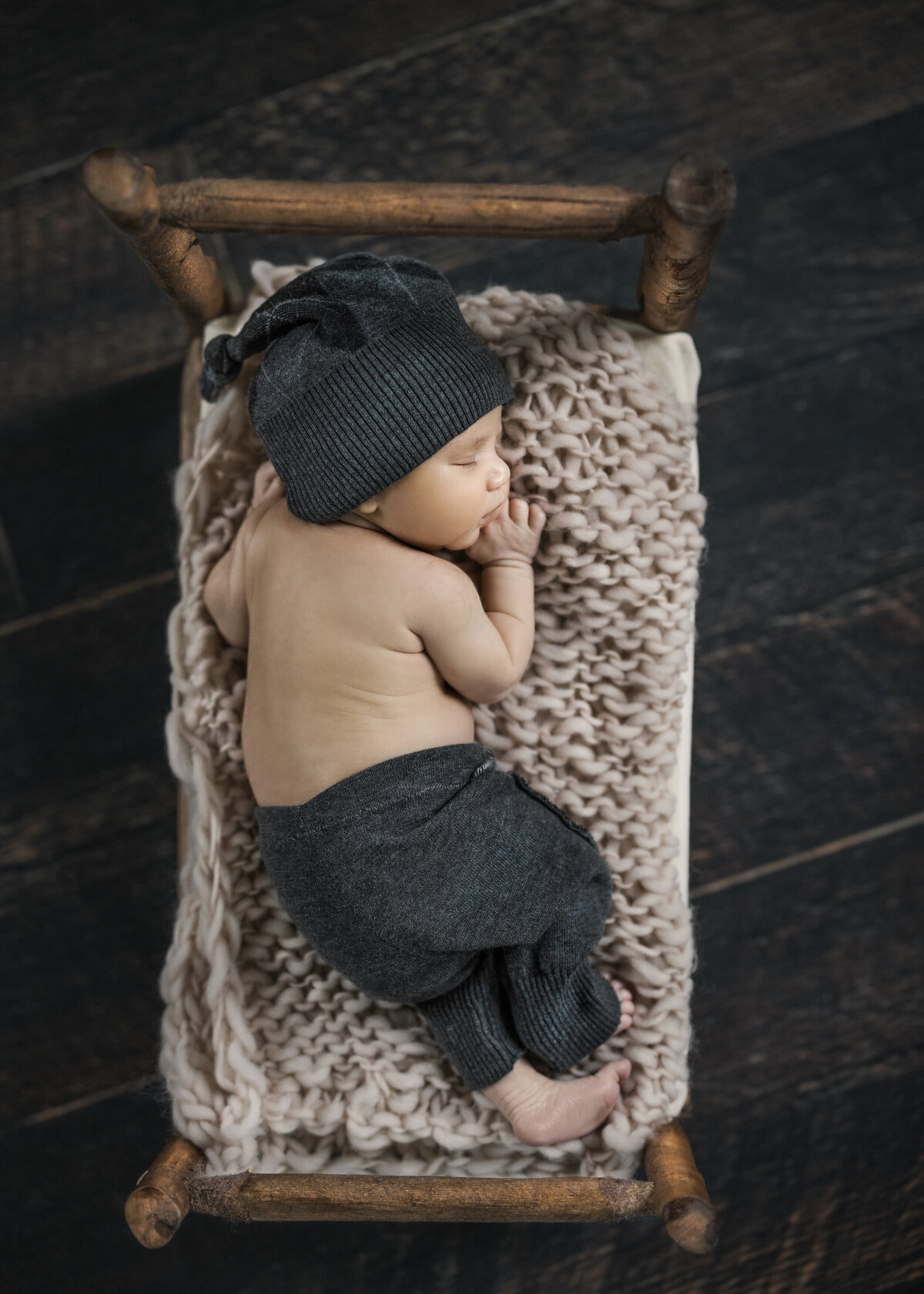 baby sleeps for photos during NJ photo studio newborn session