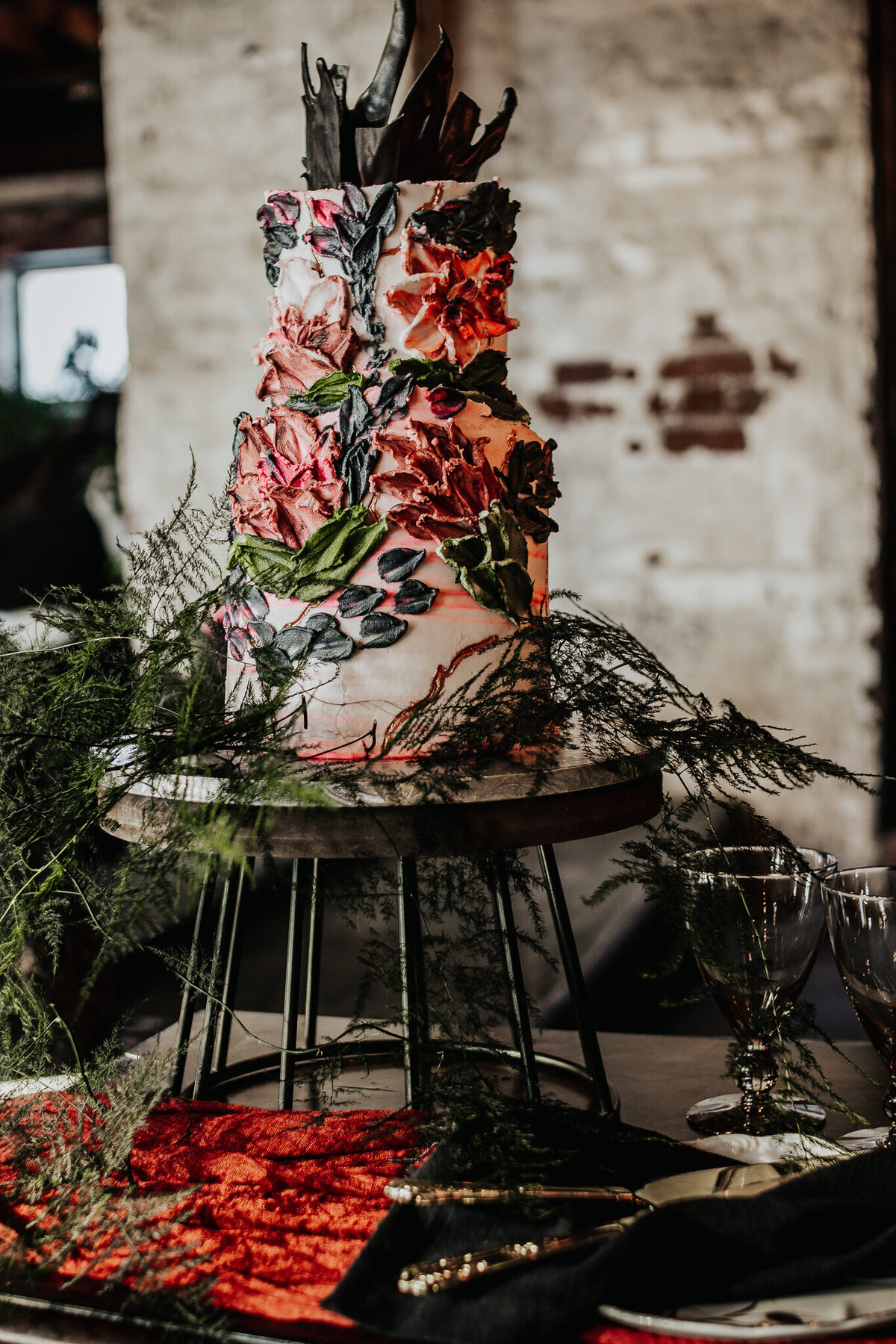 Dark and moody wedding cake detail shot