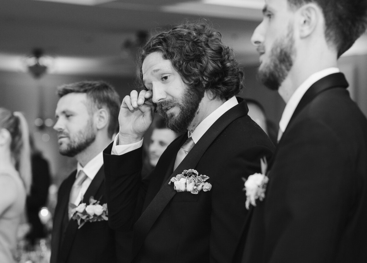 candid emotional moments at wedding reception