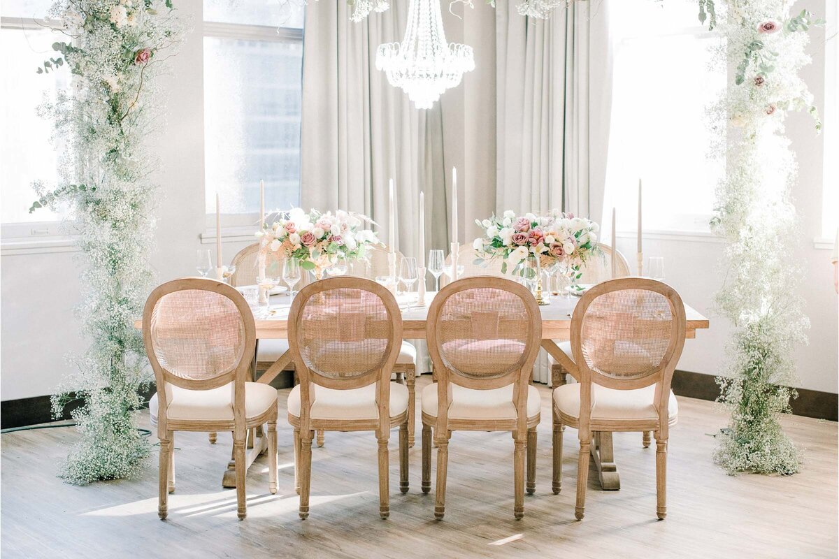 Beautiful and airy wedding reception at Hudson, a modern industrial wedding venue in Calgary, featured on the Brontë Bride Vendor Guide.