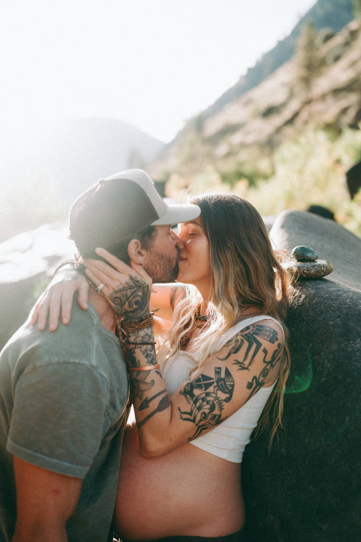 Couple during golden hour engagement and maternity shoot in Riggins, Idaho wedding/elopement - photographed by The Storytellers