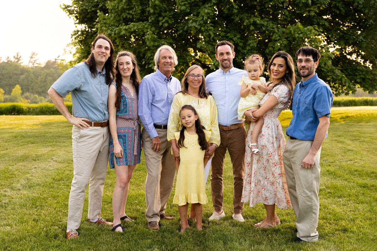 An extended family photo -- grandparents, aunts, uncles, grandchildren